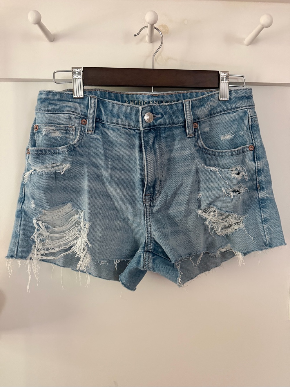 American Eagle mid-rise Stretch Light Blue Ripped Denim Jean Shorts.